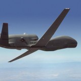 Northrop Grumman Media Resources Photo Gallery-RQ-4 Block 10 Global Hawk flying over mountains.