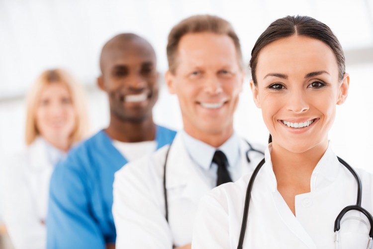 doctor, smiling, group, medical, leadership, ethnicity, standing, background, uniform, care, crowd, on, row, surgeon, practitioner, adult, out, people, skill, black, female,