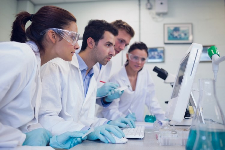 researching, researcher, research, medical, lab, health, electronic, technician, screen, specialist, woman, man, serious, studying, table, surgical glasses, practitioner, male,